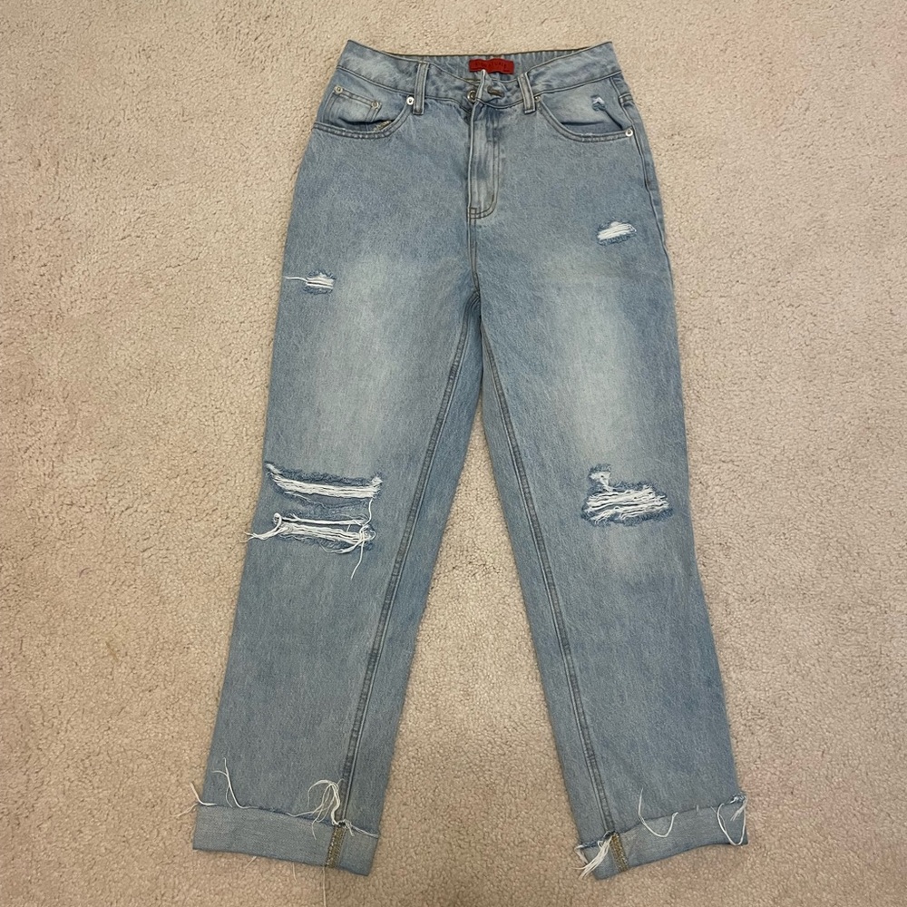 Boutique straight leg light wash ripped jeans